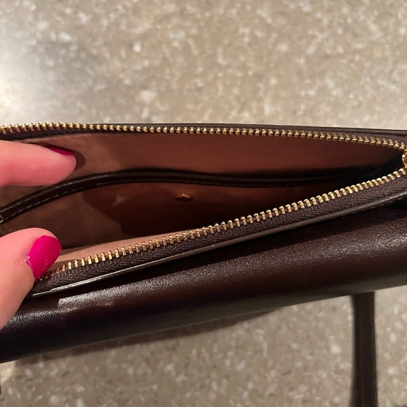 Rich chocolate brown mini bag has an adjustable shoulder strap and gold letters - Picture 8 of 12